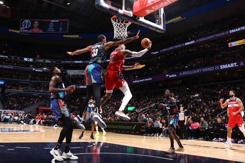 WASHINGTON, DC -? MARCH 27: Kyle Kuzma #33 of the Washington Wizards drives to the basket during the game against the Brooklyn Nets on March 27, 2024 NBAE at Capital One Arena in Washington, DC. NOTE TO USER: User expressly acknowledges and agrees that, by downloading and or using this Photograph, user is consenting to the terms and conditions of the Getty Images License Agreement. Mandatory Copyright Notice: Copyright 2024 NBAE (Photo by Kenny Giarla/NBAE via Getty Images)