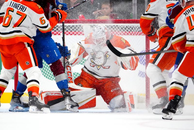 Oct 18, 2024; Denver, Colorado, USA; Anaheim Ducks goaltender Lukas Dostal (1) makes a save in the third period against the Colorado Avalanche at Ball Arena. Mandatory Credit: Ron Chenoy-Imagn Images