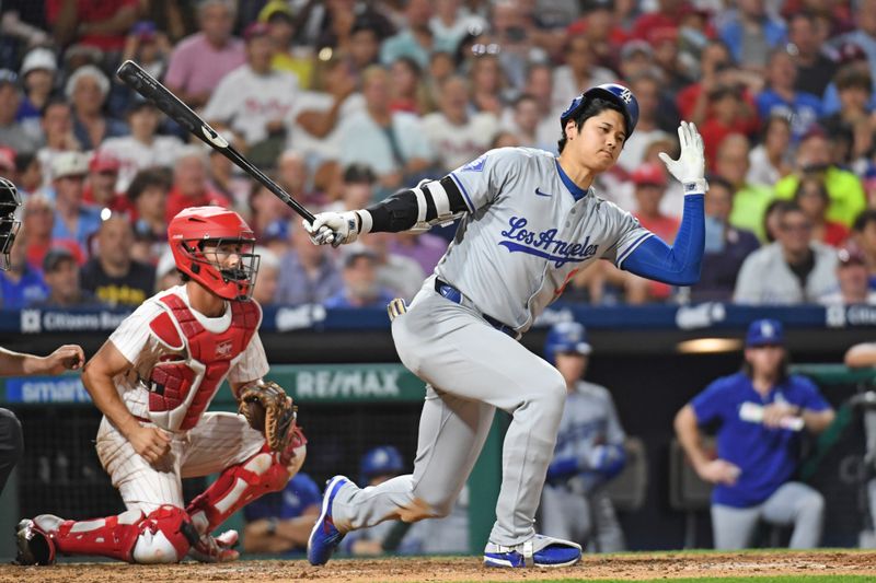 Jul 10, 2024; Philadelphia, Pennsylvania, USA; Los Angeles Dodgers two-way player Shohei Ohtani (17) loses his batting helmet after striking out during the seventh inning against the Philadelphia Phillies at Citizens Bank Park. Mandatory Credit: Eric Hartline-USA TODAY Sports