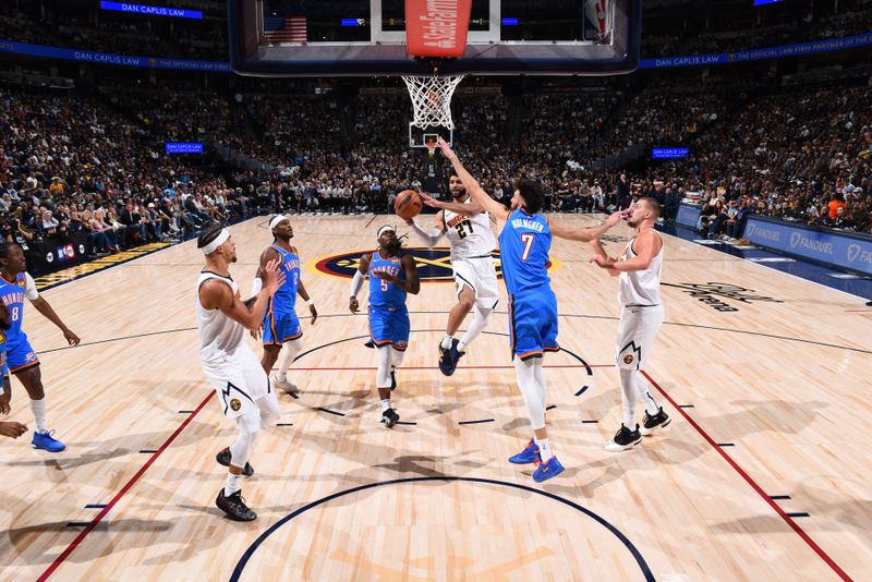 DENVER, CO - OCTOBER 24: Jamal Murray #27 of the Denver Nuggets drives to the basket during the game against the Oklahoma City Thunder on October 24, 2024 at Ball Arena in Denver, Colorado. NOTE TO USER: User expressly acknowledges and agrees that, by downloading and/or using this Photograph, user is consenting to the terms and conditions of the Getty Images License Agreement. Mandatory Copyright Notice: Copyright 2024 NBAE (Photo by Garrett Ellwood/NBAE via Getty Images)