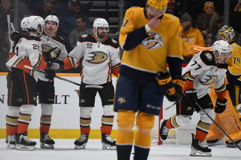 Jan 9, 2024; Nashville, Tennessee, USA; Anaheim Ducks right wing Frank Vatrano (77) celebrates after a goal during the first period against the Nashville Predators at Bridgestone Arena. Mandatory Credit: Christopher Hanewinckel-USA TODAY Sports