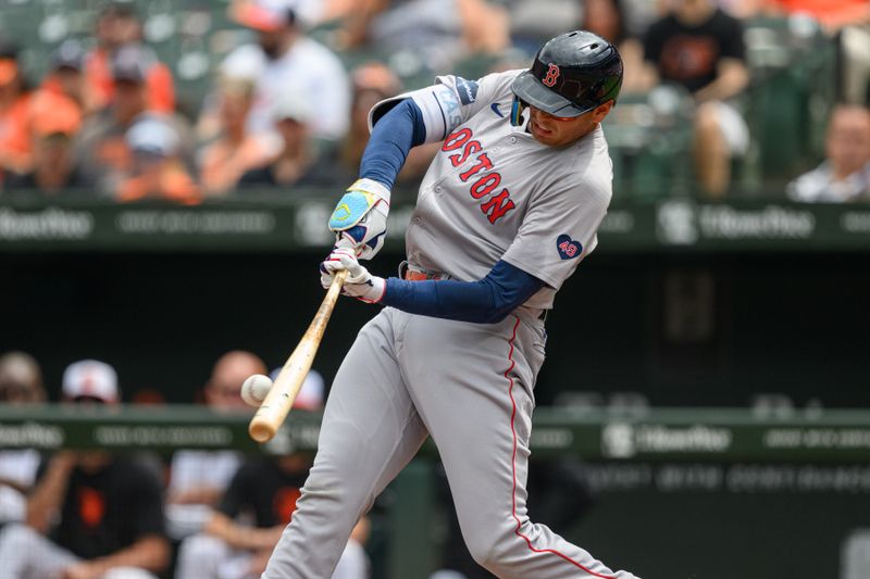 Aug 18, 2024; Baltimore, Maryland, USA; Boston Red Sox first baseman Triston Casas (36) hits a single during the fourth inning against the Baltimore Orioles at Oriole Park at Camden Yards. Mandatory Credit: Reggie Hildred-USA TODAY Sports