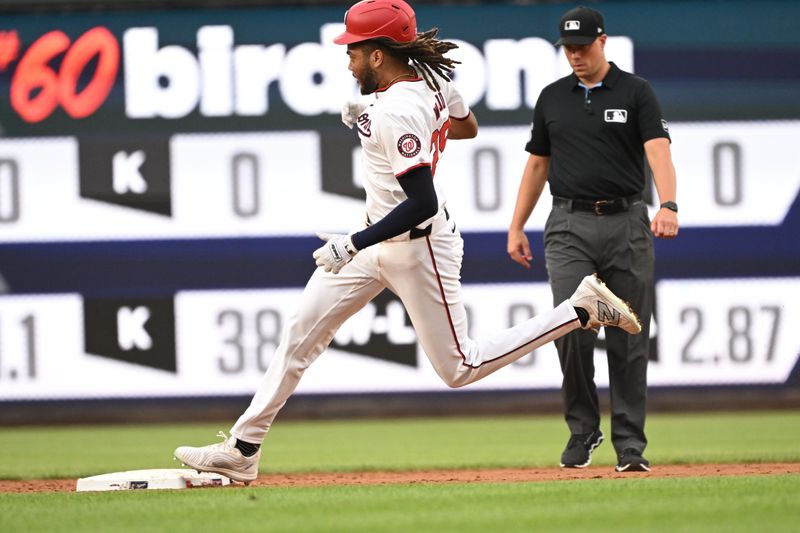 Aug 6, 2024; Washington, District of Columbia, USA; Washington Nationals center fielder James Wood (29) tags second base after hitting a triple against the San Francisco Giants during the second inning at Nationals Park. Mandatory Credit: Rafael Suanes-USA TODAY Sports