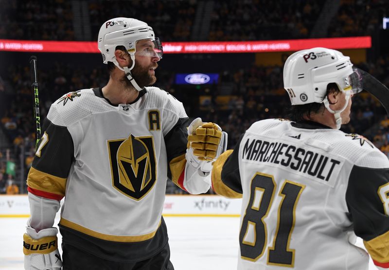 Apr 4, 2023; Nashville, Tennessee, USA; Vegas Golden Knights defenseman Alex Pietrangelo (7) celebrates with right wing Jonathan Marchessault (81) after scoring during the second period against the Nashville Predators at Bridgestone Arena. Mandatory Credit: Christopher Hanewinckel-USA TODAY Sports