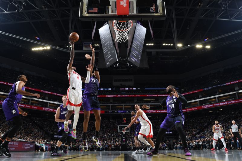 SACRAMENTO, CA - DECEMBER 3: Jalen Green #4 of the Houston Rockets drives to the basket during the game against the Sacramento Kings during the Emirates NBA Cup game on December 3, 2024 at Golden 1 Center in Sacramento, California. NOTE TO USER: User expressly acknowledges and agrees that, by downloading and or using this Photograph, user is consenting to the terms and conditions of the Getty Images License Agreement. Mandatory Copyright Notice: Copyright 2024 NBAE (Photo by Adam Pantozzi/NBAE via Getty Images)