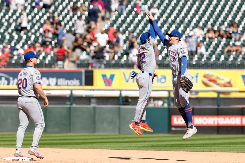 Sep 1, 2024; Chicago, Illinois, USA; New York Mets shortstop Francisco Lindor (12) and outfielder Brandon Nimmo (9) celebrate after defeating the Chicago White Sox in a baseball game at Guaranteed Rate Field. Mandatory Credit: Kamil Krzaczynski-USA TODAY Sports