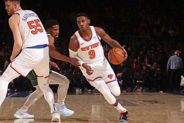 NEW YORK, NY - DECEMBER 25: RJ Barrett #9 of the New York Knicks handles the ball during the game against the Milwaukee Bucks on December 25, 2023 at Madison Square Garden in New York City, New York.  NOTE TO USER: User expressly acknowledges and agrees that, by downloading and or using this photograph, User is consenting to the terms and conditions of the Getty Images License Agreement. Mandatory Copyright Notice: Copyright 2023 NBAE  (Photo by Nathaniel S. Butler/NBAE via Getty Images)