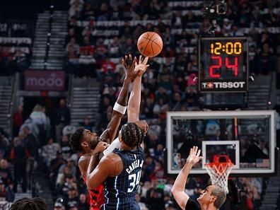 PORTLAND, OR - OCTOBER 27: The opening tipoff on October 27, 2023 at the Moda Center Arena in Portland, Oregon. NOTE TO USER: User expressly acknowledges and agrees that, by downloading and or using this photograph, user is consenting to the terms and conditions of the Getty Images License Agreement. Mandatory Copyright Notice: Copyright 2023 NBAE (Photo by Cameron Browne/NBAE via Getty Images)