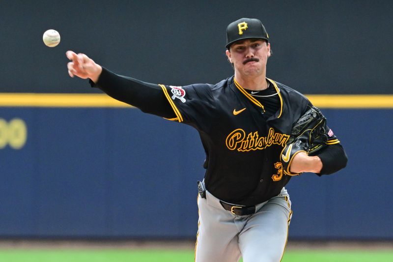 Jul 11, 2024; Milwaukee, Wisconsin, USA; Pittsburgh Pirates starting pitcher Paul Skenes (30) pitches in the first inning against the Milwaukee Brewers at American Family Field. Mandatory Credit: Benny Sieu-USA TODAY Sports