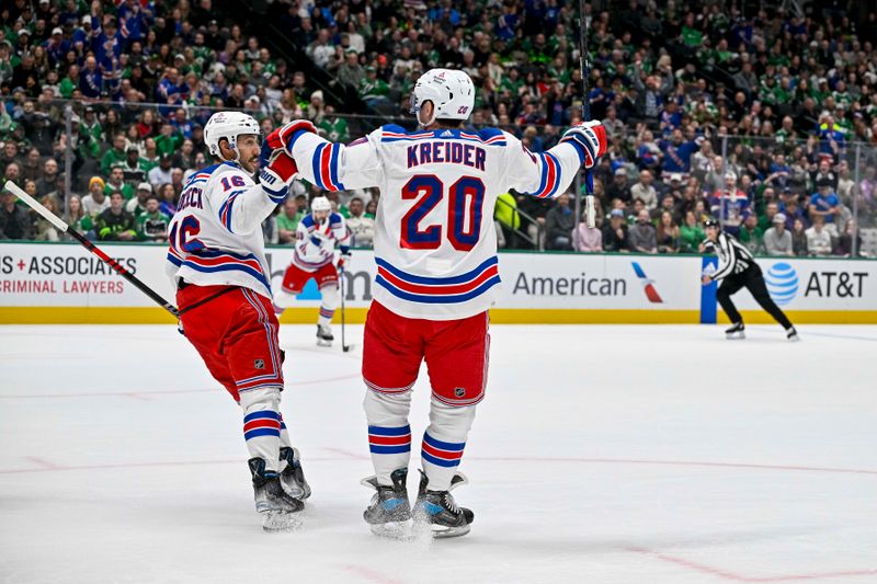 Nov 20, 2023; Dallas, Texas, USA; New York Rangers center Vincent Trocheck (16) and left wing Chris Kreider (20) celebrates a power play goal scored by Trocheck against the Dallas Stars during the first period at the American Airlines Center. Mandatory Credit: Jerome Miron-USA TODAY Sports