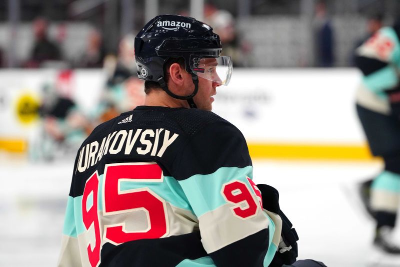 Mar 21, 2024; Las Vegas, Nevada, USA; Seattle Kraken left wing Andre Burakovsky (95) warms up before a game against the Vegas Golden Knights at T-Mobile Arena. Mandatory Credit: Stephen R. Sylvanie-USA TODAY Sports