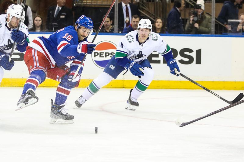 Jan 8, 2024; New York, New York, USA;  New York Rangers center Vincent Trocheck (16) and Vancouver Canucks right wing Brock Boeser (6) chases the puck in the first period at Madison Square Garden. Mandatory Credit: Wendell Cruz-USA TODAY Sports