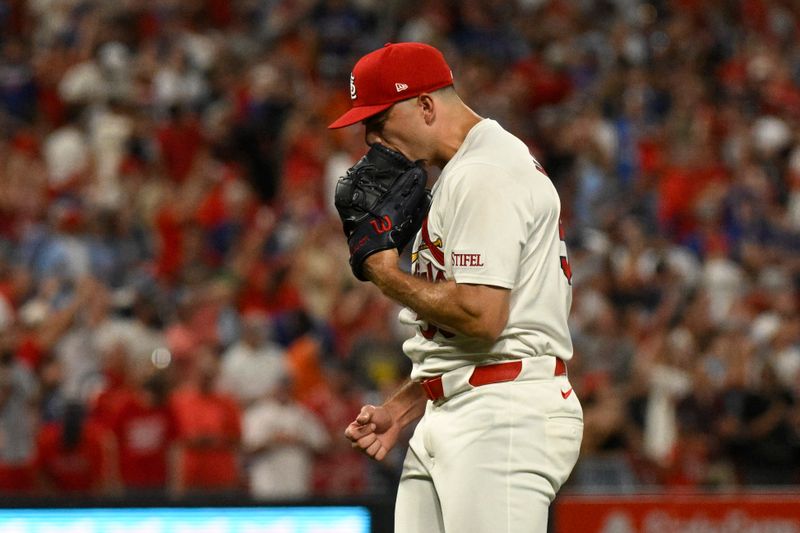 Jul 13, 2024; St. Louis, Missouri, USA; St. Louis Cardinals relief pitcher Ryan Helsley (56) reacts after defeating the Chicago Cubs at Busch Stadium. Mandatory Credit: Jeff Le-USA TODAY Sports