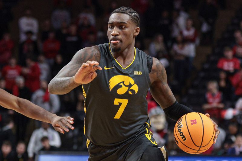 Feb 12, 2025; Piscataway, New Jersey, USA;  Iowa Hawkeyes guard Brock Harding (2) dribbles up court during the first half against the Rutgers Scarlet Knights at Jersey Mike's Arena. Mandatory Credit: Vincent Carchietta-Imagn Images