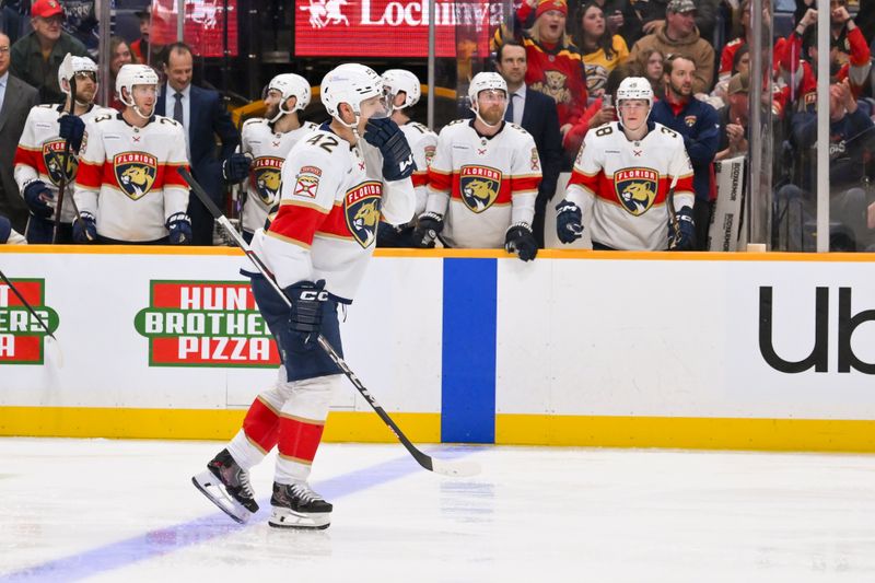 Nov 24, 2025; Nashville, Tennessee, USA;  Florida Panthers defenseman Gustav Forsling (42) celebrates his goal against the Nashville Predators during the second period at Bridgestone Arena. Mandatory Credit: Steve Roberts-Imagn Images