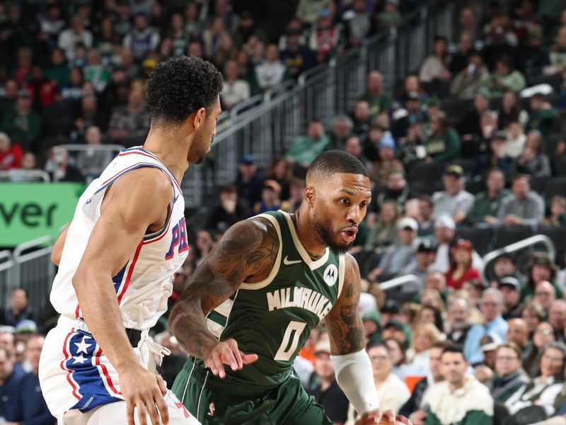 MILWAUKEE, WI - FEBRUARY 9:   Damian Lillard #0 of the Milwaukee Bucks dribbles the ball during the game against the Philadelphia 76ers on February  9, 2025 at Fiserv Forum Center in Milwaukee, Wisconsin. NOTE TO USER: User expressly acknowledges and agrees that, by downloading and or using this Photograph, user is consenting to the terms and conditions of the Getty Images License Agreement. Mandatory Copyright Notice: Copyright 2025 NBAE (Photo by Jeff Haynes/NBAE via Getty Images).