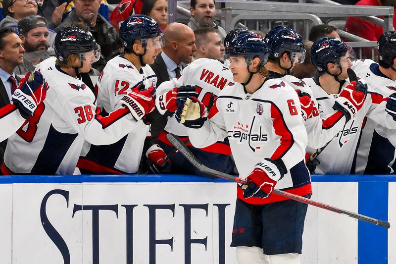 Nov 9, 2024; St. Louis, Missouri, USA;  Washington Capitals defenseman Jakob Chychrun (6) is congratulated by teammates after scoring against the St. Louis Blues during the second period at Enterprise Center. Mandatory Credit: Jeff Curry-Imagn Images