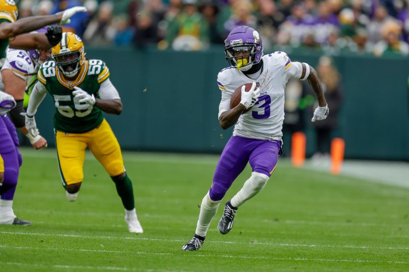 Minnesota Vikings wide receiver Jordan Addison (3) makes a catch during an NFL football game between the Green Bay Packers and Minnesota Vikings Sunday, Oct. 29, 2023, in Green Bay, Wis. (AP Photo/Matt Ludtke)