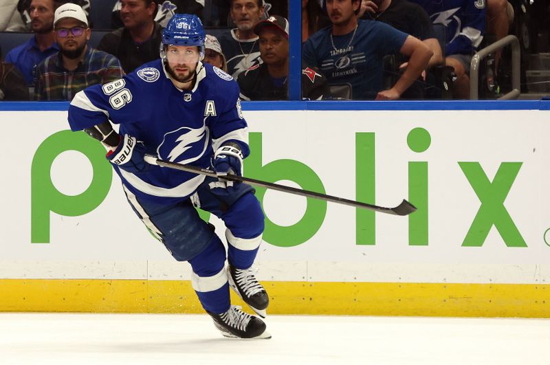 Apr 15, 2024; Tampa, Florida, USA;  Tampa Bay Lightning right wing Nikita Kucherov (86) skates against the Buffalo Sabres during the first period at Amalie Arena. Mandatory Credit: Kim Klement Neitzel-USA TODAY Sports