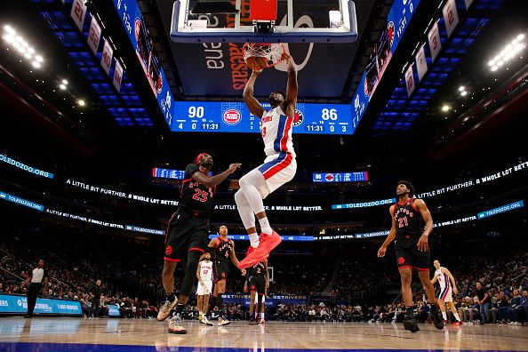 DETROIT, MI - DECEMBER 30: James Wiseman #13 of the Detroit Pistons drives to the basket during the game against the Toronto Raptors on December 30, 2023 at Little Caesars Arena in Detroit, Michigan. NOTE TO USER: User expressly acknowledges and agrees that, by downloading and/or using this photograph, User is consenting to the terms and conditions of the Getty Images License Agreement. Mandatory Copyright Notice: Copyright 2023 NBAE (Photo by Brian Sevald/NBAE via Getty Images)