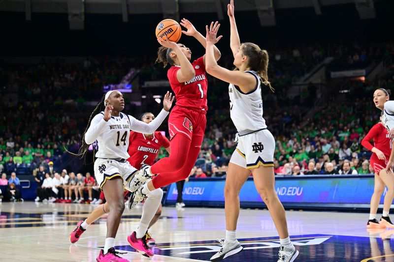 Mar 3, 2024; South Bend, Indiana, USA; Louisville Cardinals guard Sydney Taylor (1) goes up for a shot as Notre Dame Fighting Irish forward Maddy Westbeld (21) defends in the first half at the Purcell Pavilion. Mandatory Credit: Matt Cashore-USA TODAY Sports