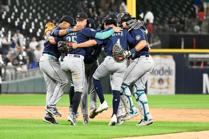 Jul 27, 2024; Chicago, Illinois, USA;  Seattle Mariners players celebrate after a game against the Chicago White Sox at Guaranteed Rate Field. Mandatory Credit: Matt Marton-USA TODAY Sports