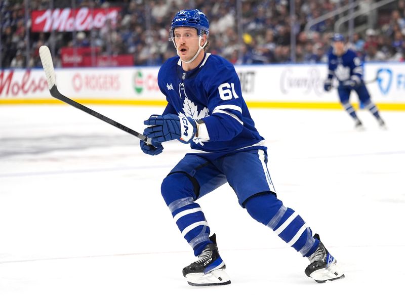 Sep 27, 2025; Toronto, Ontario, CAN; Toronto Maple Leafs forward Michael Pezzetta (61) skates against the Montreal Canadiens during the third period at Scotiabank Arena. Mandatory Credit: John E. Sokolowski-Imagn Images