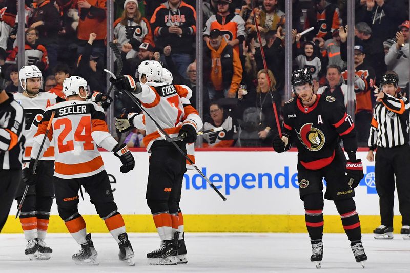 Mar 2, 2024; Philadelphia, Pennsylvania, USA; Philadelphia Flyers right wing Tyson Foerster (71) celebrates his goal with teammates against the Ottawa Senators during the second period at Wells Fargo Center. Mandatory Credit: Eric Hartline-USA TODAY Sports