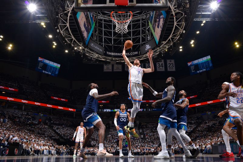 MINNEAPOLIS, MN - MAY 26:  Chet Holmgren #7 of the Oklahoma City Thunder dunks the ball during the game against the Minnesota Timberwolves during Game 4 of the 2025 NBA Western Conference Finals on May 26, 2025 at Target Center in Minneapolis, Minnesota. NOTE TO USER: User expressly acknowledges and agrees that, by downloading and or using this Photograph, user is consenting to the terms and conditions of the Getty Images License Agreement. Mandatory Copyright Notice: Copyright 2025 NBAE (Photo by Jesse D. Garrabrant/NBAE via Getty Images)