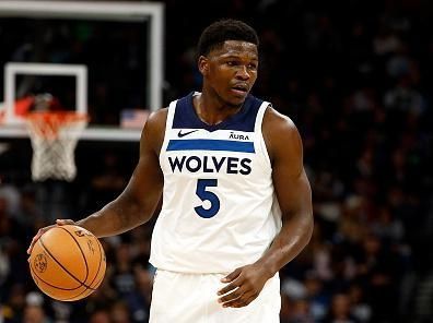 MINNEAPOLIS, MINNESOTA - NOVEMBER 01: Anthony Edwards #5 of the Minnesota Timberwolves dribbles the ball against the Denver Nuggets in the first quarter at Target Center on November 01, 2023 in Minneapolis, Minnesota. The Timberwolves defeated the Nuggets 110-89. NOTE TO USER: User expressly acknowledges and agrees that, by downloading and or using this photograph, User is consenting to the terms and conditions of the Getty Images License Agreement. (Photo by David Berding/Getty Images)