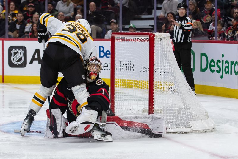 Jan 18, 2025; Ottawa, Ontario, CAN; Boston Bruins center Morgan Geekie (39) collides with Ottawa Senators goalie Leevi Merilainen (1) after scoring a goal in the second period at the Canadian Tire Centre. Mandatory Credit: Marc DesRosiers-Imagn Images