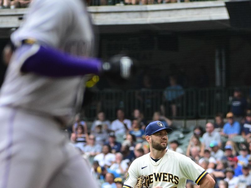 Aug 9, 2023; Milwaukee, Wisconsin, USA; Milwaukee Brewers pitcher Adrian Houser (37) looks on as Colorado Rockies designated hitter Jurickson Profar (29) runs the bases after hitting a solo home run in the fourth inning at American Family Field. Mandatory Credit: Benny Sieu-USA TODAY Sports