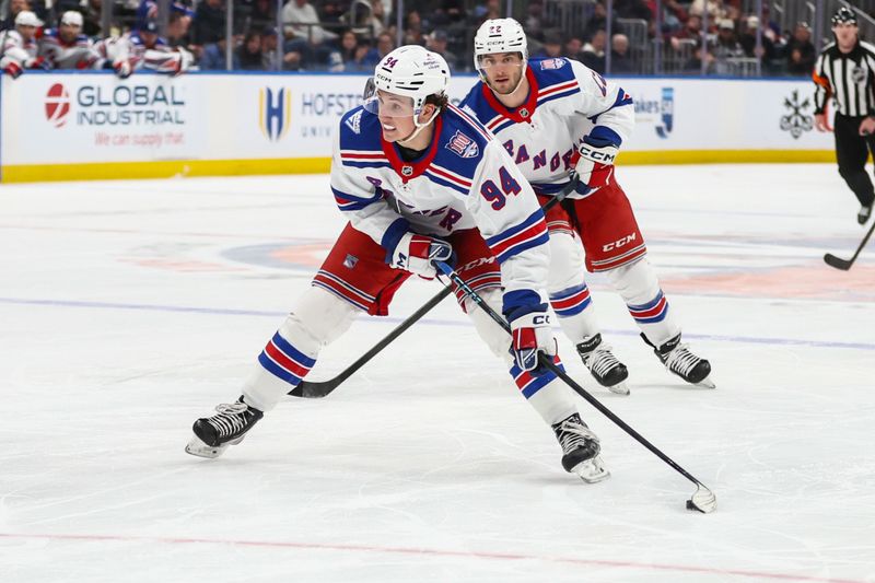 Dec 27, 2025; Elmont, New York, USA;  New York Rangers right wing Gabe Perreault (94) controls the puck in the third period against the New York Islanders at UBS Arena. Mandatory Credit: Wendell Cruz-Imagn Images