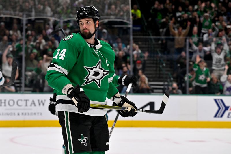 Nov 20, 2024; Dallas, Texas, USA; Dallas Stars left wing Jamie Benn (14) looks back after he scores a goal against the San Jose Sharks during the second period at the American Airlines Center. Mandatory Credit: Jerome Miron-Imagn Images