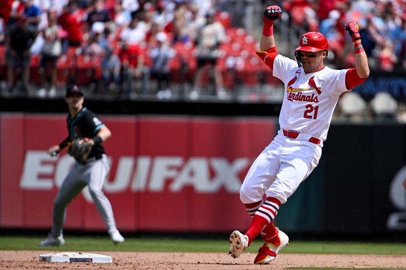 Apr 24, 2024; St. Louis, Missouri, USA;  St. Louis Cardinals left fielder Lars Nootbaar (21) reacts after hitting a two run double against the Arizona Diamondbacks during the eighth inning at Busch Stadium. Mandatory Credit: Jeff Curry-USA TODAY Sports