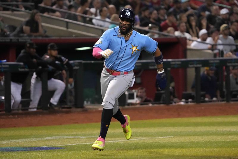 Jun 28, 2023; Phoenix, Arizona, USA; Tampa Bay Rays first baseman Yandy Diaz (2) scores a run against the Arizona Diamondbacks during the ninth inning at Chase Field. Mandatory Credit: Joe Camporeale-USA TODAY Sports