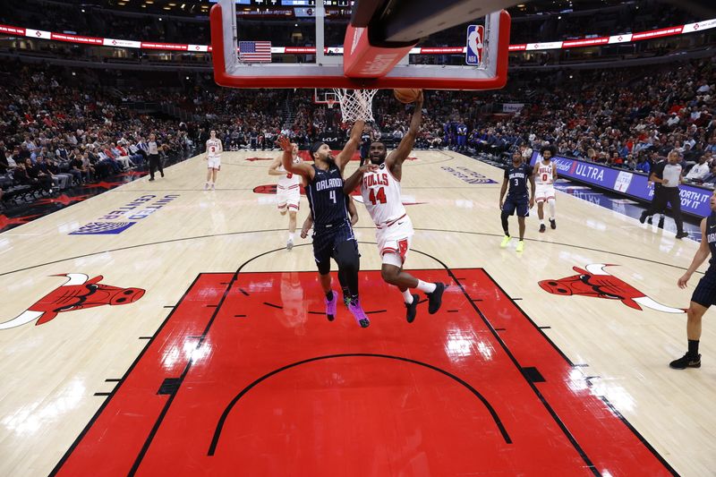 CHICAGO, IL - OCTOBER 30: Patrick Williams #44 of the Chicago Bulls drives to the basket during the game against the Orlando Magic on October 30, 2024 at United Center in Chicago, Illinois. NOTE TO USER: User expressly acknowledges and agrees that, by downloading and or using this photograph, User is consenting to the terms and conditions of the Getty Images License Agreement. Mandatory Copyright Notice: Copyright 2024 NBAE (Photo by Kamil Krzaczynski/NBAE via Getty Images)