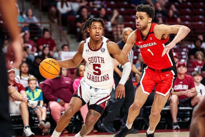 Mar 4, 2023; Columbia, South Carolina, USA; South Carolina Gamecocks guard Meechie Johnson (5) drives around Georgia Bulldogs guard Jabri Abdur-Rahim (1) in the first half at Colonial Life Arena. Mandatory Credit: Jeff Blake-USA TODAY Sports