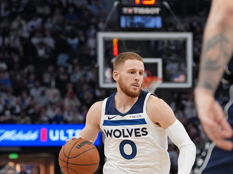 MINNEAPOLIS, MN -  OCTOBER 29: Donte DiVincenzo #0 of the Minnesota Timberwolves dribbles the ball during the game against the Dallas Mavericks on October 29, 2024 at Target Center in Minneapolis, Minnesota. NOTE TO USER: User expressly acknowledges and agrees that, by downloading and or using this Photograph, user is consenting to the terms and conditions of the Getty Images License Agreement. Mandatory Copyright Notice: Copyright 2024 NBAE (Photo by Jordan Johnson/NBAE via Getty Images)