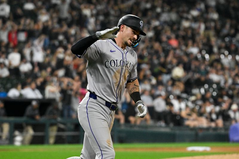 Jun 27, 2024; Chicago, Illinois, USA;  Colorado Rockies outfielder Brenton Doyle (9) reacts after hitting a two-run home run against the Chicago White Sox during the sixth inning at Guaranteed Rate Field. Mandatory Credit: Matt Marton-USA TODAY Sports