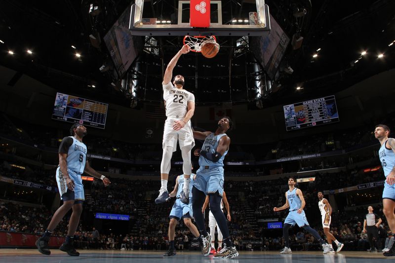 MEMPHIS, TN - FEBRUARY 12: Larry Nance Jr. #22 of the New Orleans Pelicans dunks the ball during the game against the Memphis Grizzlies on February 12, 2024 at FedExForum in Memphis, Tennessee. NOTE TO USER: User expressly acknowledges and agrees that, by downloading and or using this photograph, User is consenting to the terms and conditions of the Getty Images License Agreement. Mandatory Copyright Notice: Copyright 2024 NBAE (Photo by Joe Murphy/NBAE via Getty Images)