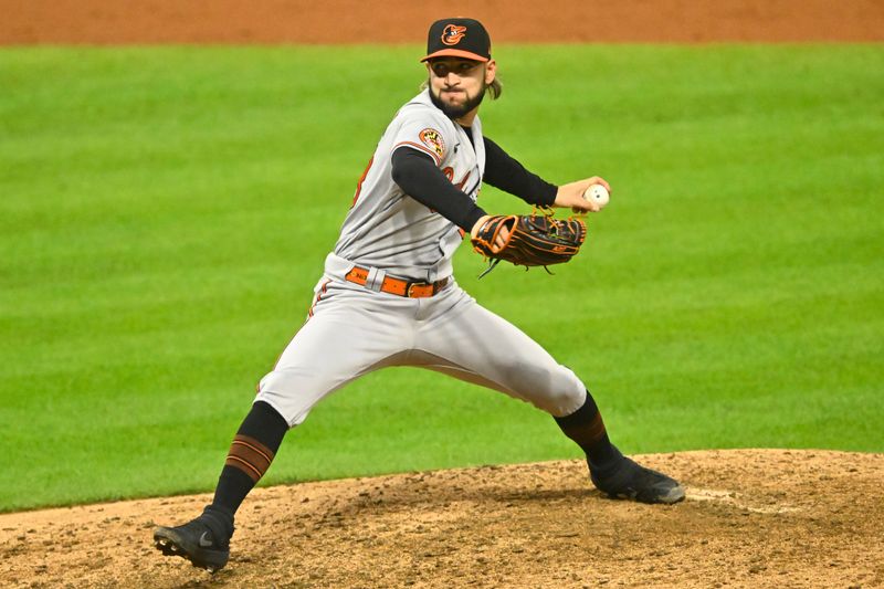 Sep 21, 2023; Cleveland, Ohio, USA; Baltimore Orioles relief pitcher Cionel Perez (58) delivers a pitch in the eighth inning against the Cleveland Guardians at Progressive Field. Mandatory Credit: David Richard-USA TODAY Sports