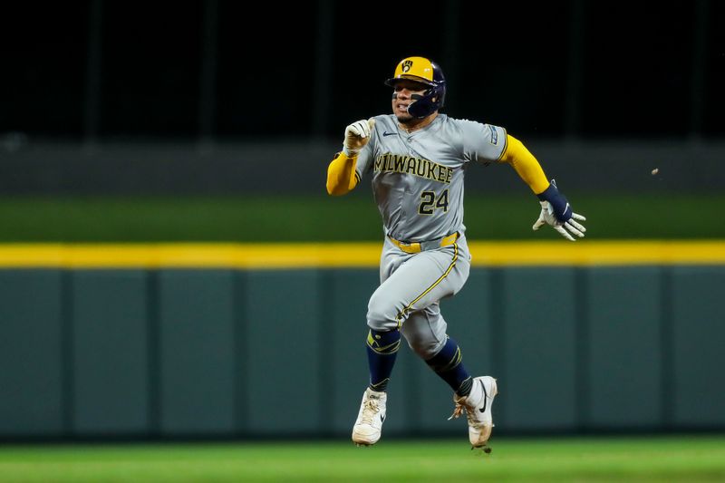 Apr 9, 2024; Cincinnati, Ohio, USA; Milwaukee Brewers catcher William Contreras (24) runs to third base on a double hit by shortstop Willy Adames (not pictured) in the seventh inning against the Cincinnati Reds at Great American Ball Park. Mandatory Credit: Katie Stratman-USA TODAY Sports