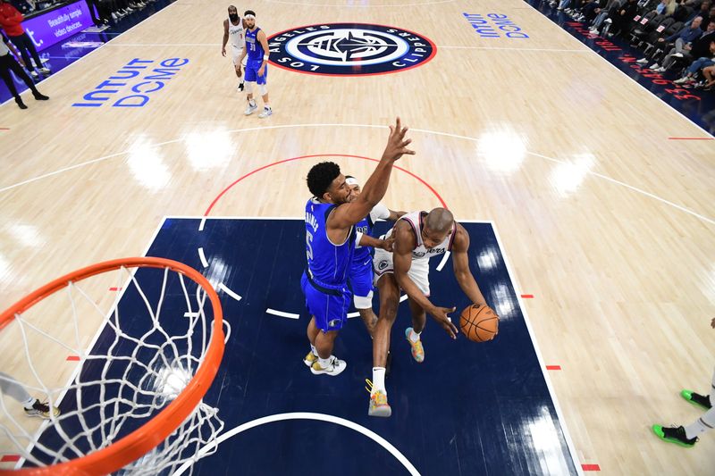 INGLEWOOD, CA - OCTOBER 14: Kai Jones #23 of the LA Clippers handles the ball during the game against the Dallas Mavericks during a NBA Preseason game on October 14, 2024 at the Intuit Dome in Inglewood, California. NOTE TO USER: User expressly acknowledges and agrees that, by downloading and/or using this Photograph, user is consenting to the terms and conditions of the Getty Images License Agreement. Mandatory Copyright Notice: Copyright 2024 NBAE (Photo by Adam Pantozzi/NBAE via Getty Images)