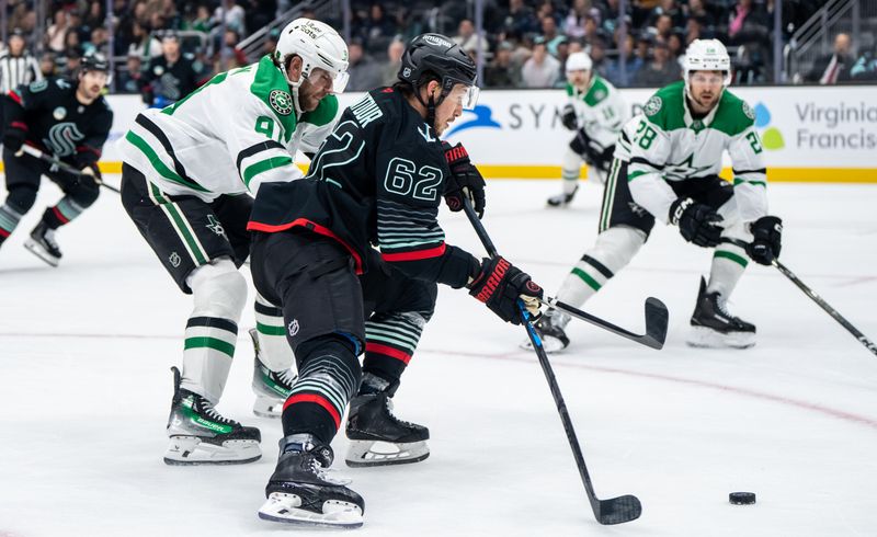 Nov 26, 2025; Seattle, Washington, USA; Seattle Kraken defenseman Brandon Montour (62) skates against Dallas Stars forward Tyler Seguin (91) during the second period at Climate Pledge Arena. Mandatory Credit: Stephen Brashear-Imagn Images