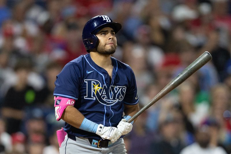 Sep 11, 2024; Philadelphia, Pennsylvania, USA; Tampa Bay Rays first base Jonathan Aranda (62) hits a solo home run during the sixth inning against the Philadelphia Phillies at Citizens Bank Park. Mandatory Credit: Bill Streicher-Imagn Images