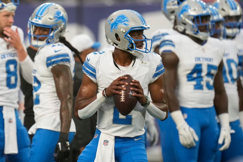 Detroit Lions quarterback Hendon Hooker (2) warms up before an NFL football game against the New York Giants, Thursday, Aug. 8, 2024, in East Rutherford, N.J. (AP Photo/Seth Wenig)