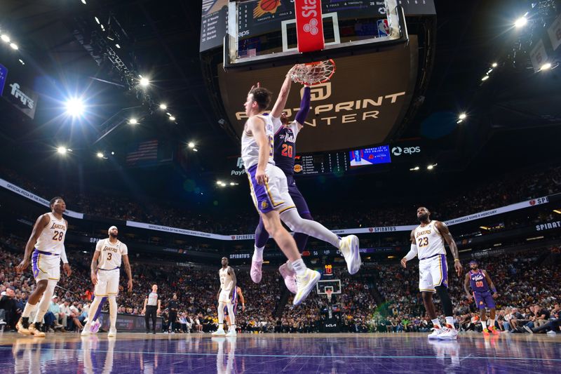 PHOENIX, AZ - FEBRUARY 25: Jusuf Nurkic #20 of the Phoenix Suns dunks the ball during the game against the Los Angeles Lakers on February 25, 2024 at Footprint Center in Phoenix, Arizona. NOTE TO USER: User expressly acknowledges and agrees that, by downloading and or using this photograph, user is consenting to the terms and conditions of the Getty Images License Agreement. Mandatory Copyright Notice: Copyright 2024 NBAE (Photo by Kate Frese/NBAE via Getty Images)