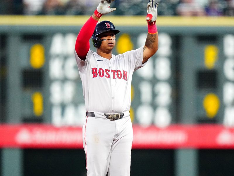 Jul 23, 2024; Denver, Colorado, USA; Boston Red Sox third base Rafael Devers (11) during the sixth inning against the Colorado Rockies at Coors Field. Mandatory Credit: Ron Chenoy-USA TODAY Sports