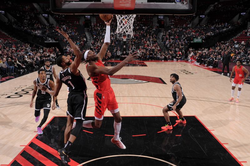 PORTLAND, OR - JANUARY 17: Jerami Grant #9 of the Portland Trail Blazers drives to the basket during the game against the Brooklyn Nets on January 17, 2024 at the Moda Center Arena in Portland, Oregon. NOTE TO USER: User expressly acknowledges and agrees that, by downloading and or using this photograph, user is consenting to the terms and conditions of the Getty Images License Agreement. Mandatory Copyright Notice: Copyright 2024 NBAE (Photo by Cameron Browne/NBAE via Getty Images)